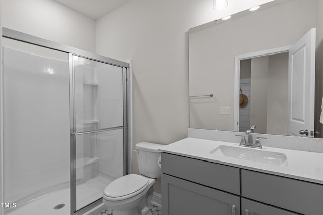518 Toran Dr, Wake Forest, NC 27587 - full bathroom with vanity, toilet, a stall shower, and baseboards