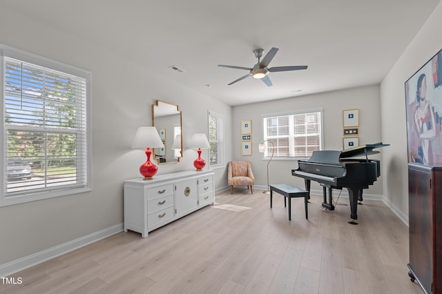518 Toran Dr, Wake Forest, NC 27587 - living area with a ceiling fan, healthy amount of natural light, and baseboards