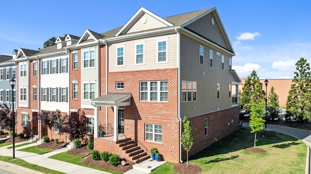 518 Toran Dr, Wake Forest, NC 27587 - multi unit property with brick siding and a front lawn
