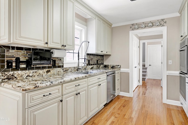 2709 Les Paul Ln, Apex, NC 27539 - kitchen featuring dishwasher, a sink, light wood-type flooring, decorative backsplash, and light stone countertops