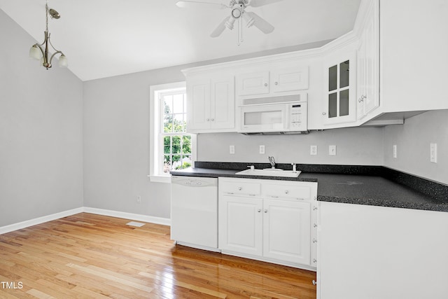 2709 Les Paul Ln, Apex, NC 27539 - kitchen featuring white appliances, a sink, dark countertops, ceiling fan, and white cabinets