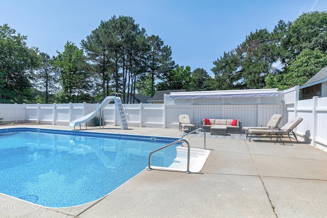 2709 Les Paul Ln, Apex, NC 27539 - view of pool with a water slide, a patio, a fenced backyard, and an outdoor hangout area