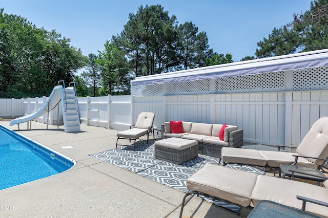 2709 Les Paul Ln, Apex, NC 27539 - fenced backyard with a patio area and an outdoor hangout area