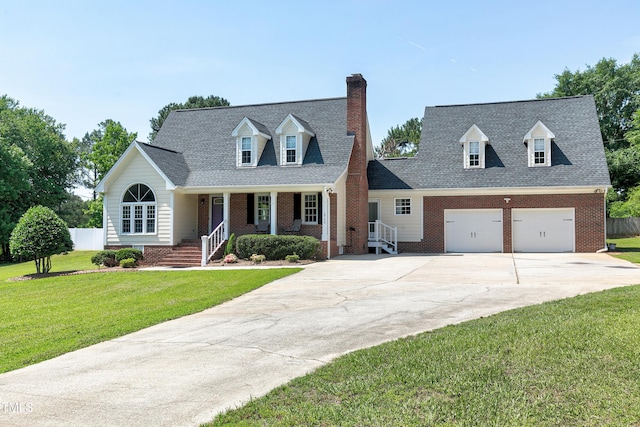 2709 Les Paul Ln, Apex, NC 27539 - cape cod house featuring driveway, brick siding, a chimney, and covered porch