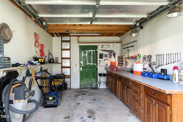 2709 Les Paul Ln, Apex, NC 27539 - garage with a workshop area
