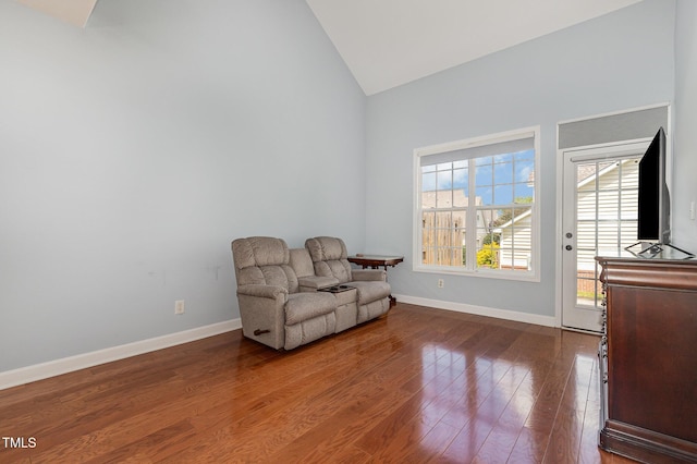 8004 Thrush Ridge Ln, Raleigh, NC 27615 - sitting room featuring dark wood-style flooring and high vaulted ceiling