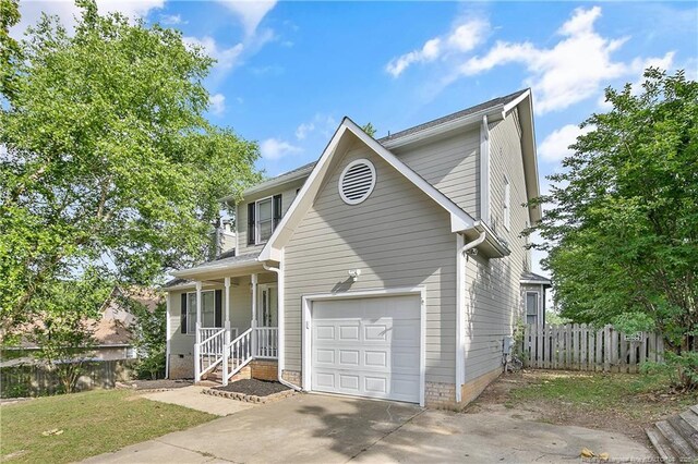 994 Eastman Rd, Fayetteville, NC 28314 - traditional-style house with driveway and covered porch