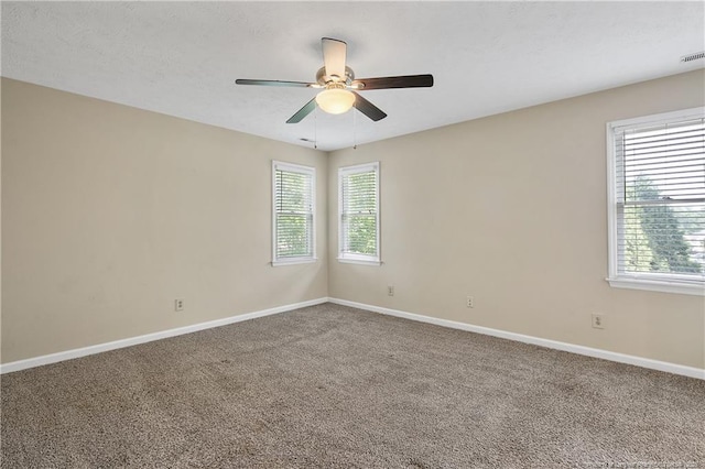 994 Eastman Rd, Fayetteville, NC 28314 - carpeted empty room with plenty of natural light, ceiling fan, and baseboards