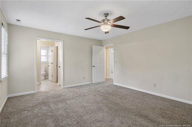 994 Eastman Rd, Fayetteville, NC 28314 - unfurnished bedroom with carpet floors, baseboards, ensuite bath, and ceiling fan