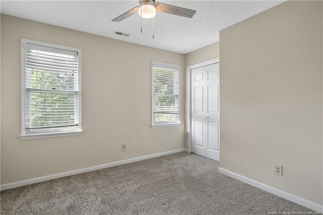 994 Eastman Rd, Fayetteville, NC 28314 - unfurnished bedroom with carpet floors, baseboards, a closet, and ceiling fan