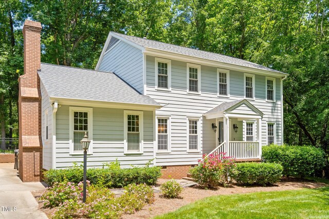 2107 Somers Ave, Burlington, NC 27215 - colonial home with roof with shingles and a chimney