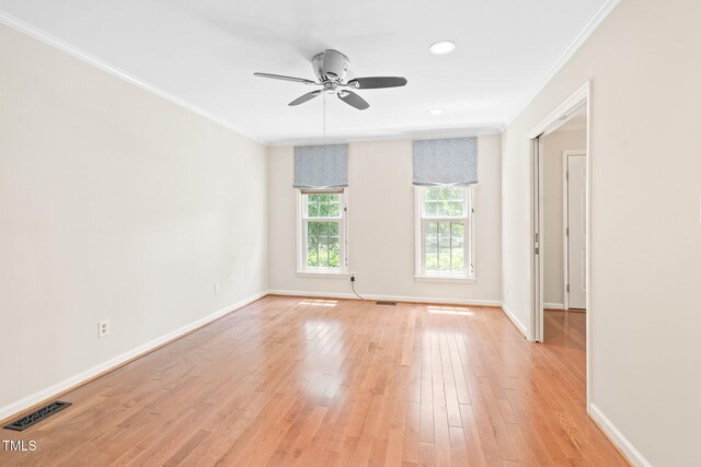 2107 Somers Ave, Burlington, NC 27215 - unfurnished room with crown molding, a ceiling fan, baseboards, light wood-style flooring, and recessed lighting