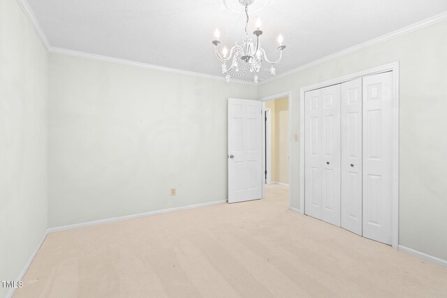 2107 Somers Ave, Burlington, NC 27215 - unfurnished bedroom with a chandelier, ornamental molding, light carpet, and baseboards