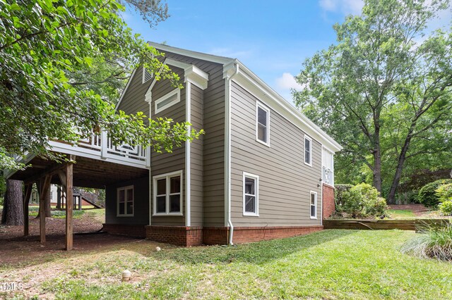 108 Ripplewater Ln, Cary, NC 27518 - view of side of home with a wooden deck and a yard