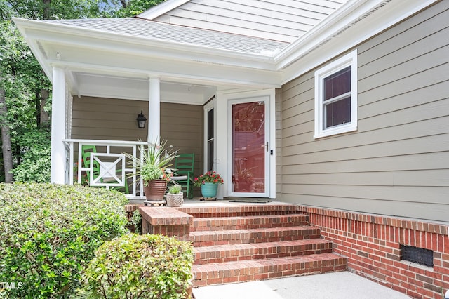 108 Ripplewater Ln, Cary, NC 27518 - view of exterior entry with a shingled roof