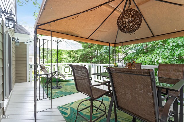 108 Ripplewater Ln, Cary, NC 27518 - wooden terrace with a gazebo and outdoor dining area