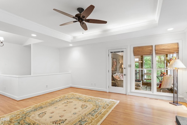 108 Ripplewater Ln, Cary, NC 27518 - spare room with crown molding, a tray ceiling, wood finished floors, recessed lighting, and a ceiling fan