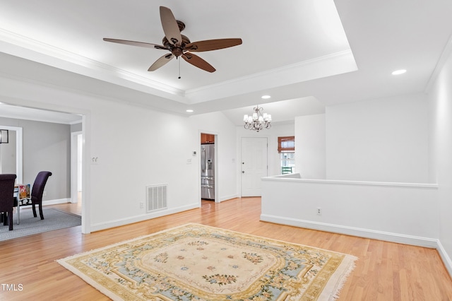 108 Ripplewater Ln, Cary, NC 27518 - living area featuring a raised ceiling, crown molding, a chandelier, light wood finished floors, and recessed lighting