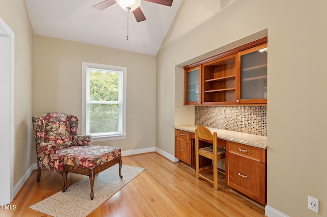 108 Ripplewater Ln, Cary, NC 27518 - office with light wood finished floors, vaulted ceiling, built in study area, ceiling fan, and baseboards