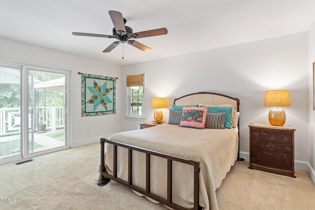108 Ripplewater Ln, Cary, NC 27518 - carpeted bedroom featuring access to outside, multiple windows, and baseboards