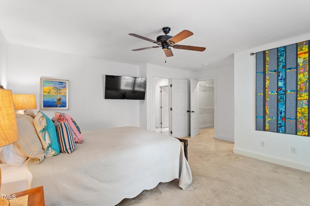 108 Ripplewater Ln, Cary, NC 27518 - carpeted bedroom featuring baseboards, a ceiling fan, and a spacious closet