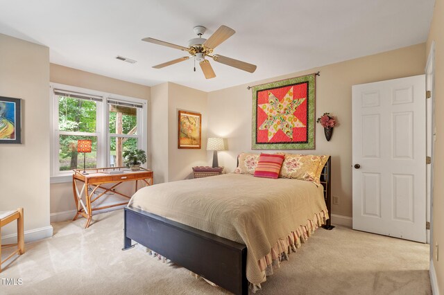 108 Ripplewater Ln, Cary, NC 27518 - bedroom with light carpet, baseboards, and a ceiling fan