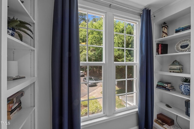 166 Greenmont Ln, Cary, NC 27511 - doorway to outside featuring built in shelves