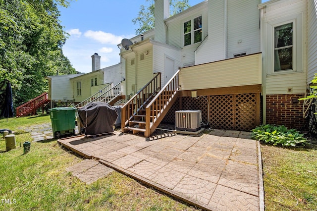 166 Greenmont Ln, Cary, NC 27511 - rear view of property with stairs, central air condition unit, a patio area, brick siding, and a chimney
