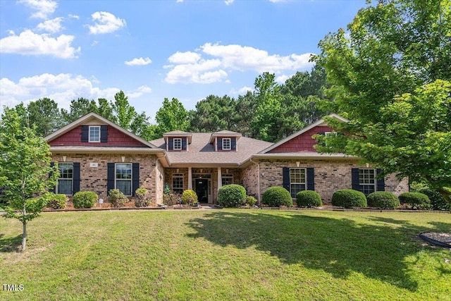 46 Spring Haven Ln, Willow Springs, NC 27592 - view of front facade with a front lawn, brick siding, and roof with shingles
