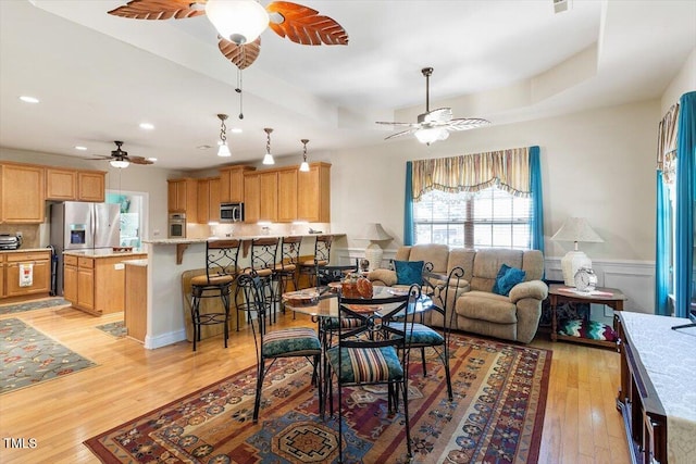 46 Spring Haven Ln, Willow Springs, NC 27592 - dining area featuring ceiling fan, light wood-style flooring, a wainscoted wall, and recessed lighting