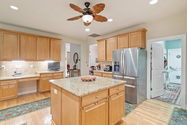 46 Spring Haven Ln, Willow Springs, NC 27592 - kitchen with stainless steel fridge with ice dispenser, light wood finished floors, decorative backsplash, a ceiling fan, and recessed lighting