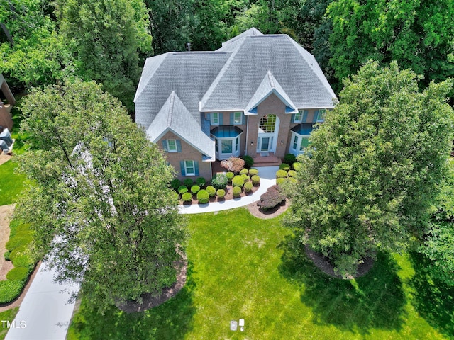 225 Midenhall Way, Cary, NC 27513 - view of front facade featuring a front lawn and a shingled roof