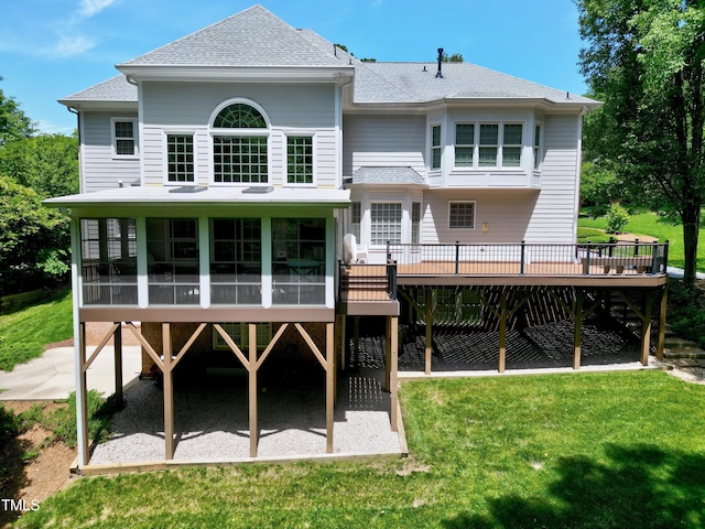 225 Midenhall Way, Cary, NC 27513 - rear view of house with a deck, a sunroom, a shingled roof, and a lawn