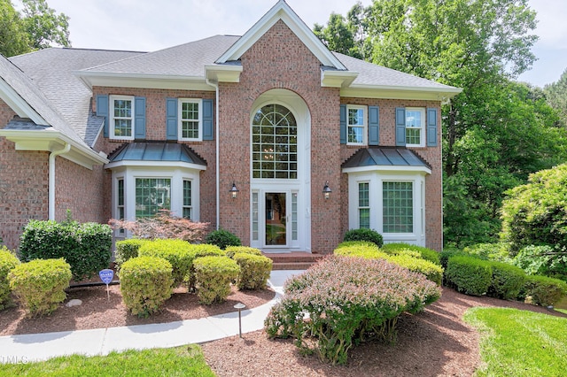 225 Midenhall Way, Cary, NC 27513 - view of front of home featuring brick siding and a shingled roof