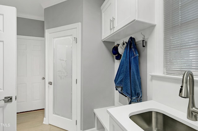 225 Midenhall Way, Cary, NC 27513 - mudroom with a sink and crown molding