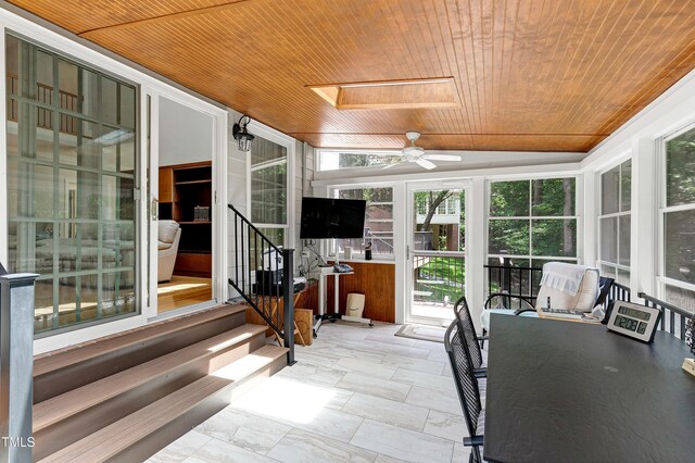 225 Midenhall Way, Cary, NC 27513 - sunroom / solarium featuring a skylight, a ceiling fan, entry steps, and lofted ceiling