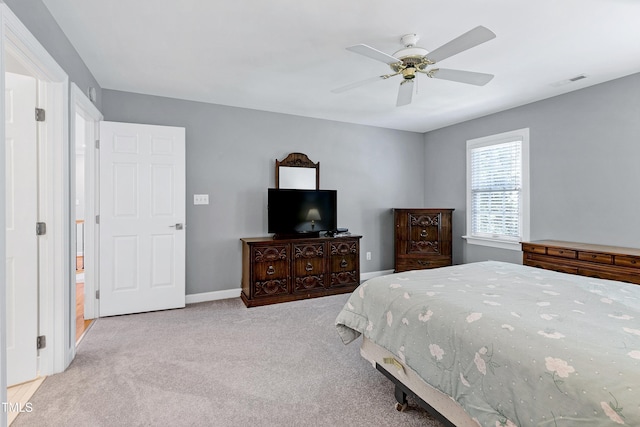 225 Midenhall Way, Cary, NC 27513 - carpeted bedroom with ceiling fan and baseboards