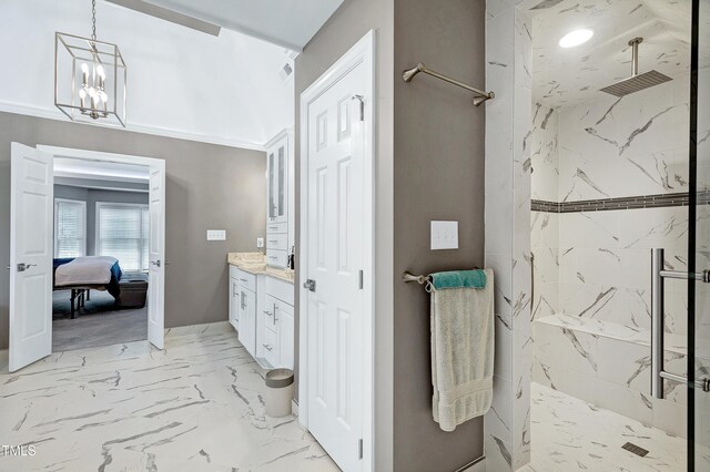 225 Midenhall Way, Cary, NC 27513 - full bathroom featuring a marble finish shower, marble finish floors, vanity, and a chandelier