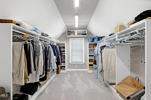 225 Midenhall Way, Cary, NC 27513 - walk in closet featuring lofted ceiling and carpet floors