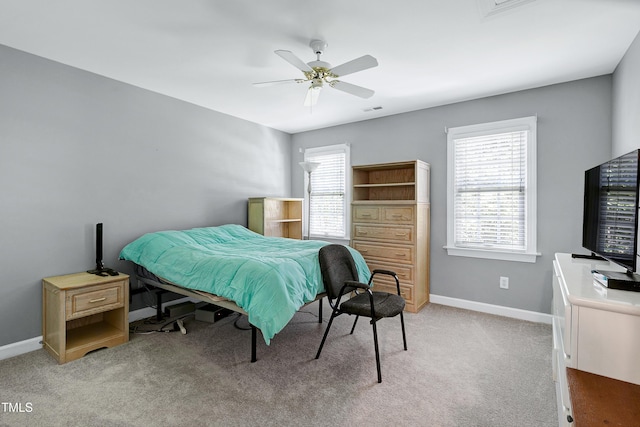 225 Midenhall Way, Cary, NC 27513 - bedroom with baseboards, light carpet, and ceiling fan