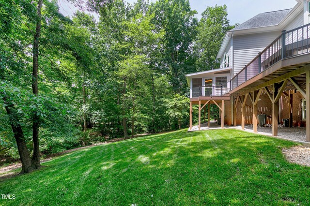 225 Midenhall Way, Cary, NC 27513 - view of grassy yard featuring a sunroom and a wooden deck