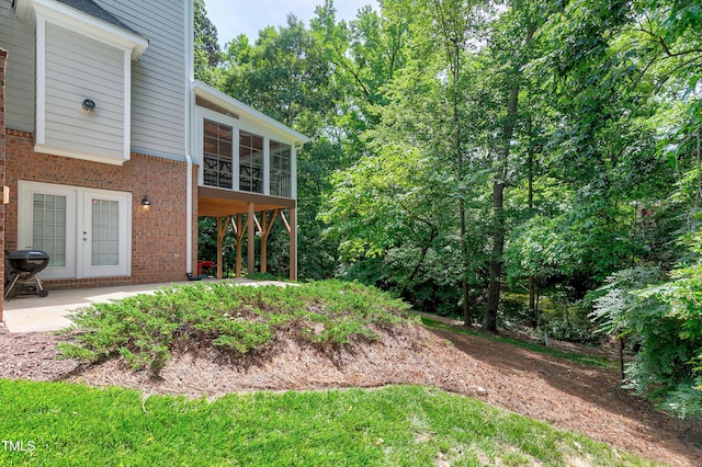 225 Midenhall Way, Cary, NC 27513 - view of yard with french doors