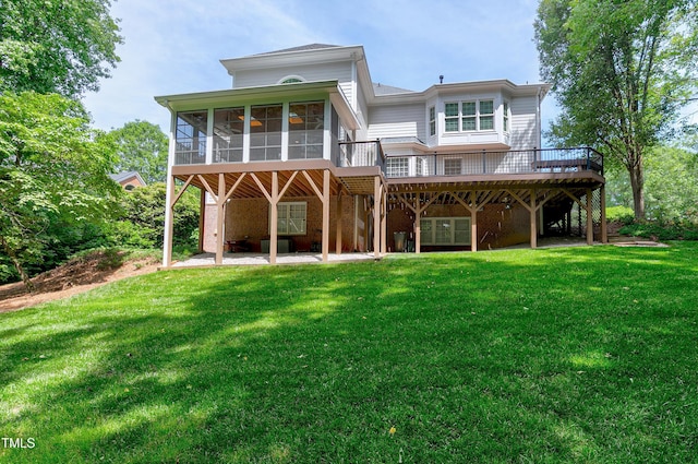 225 Midenhall Way, Cary, NC 27513 - back of house with a sunroom, a deck, a yard, and a patio area