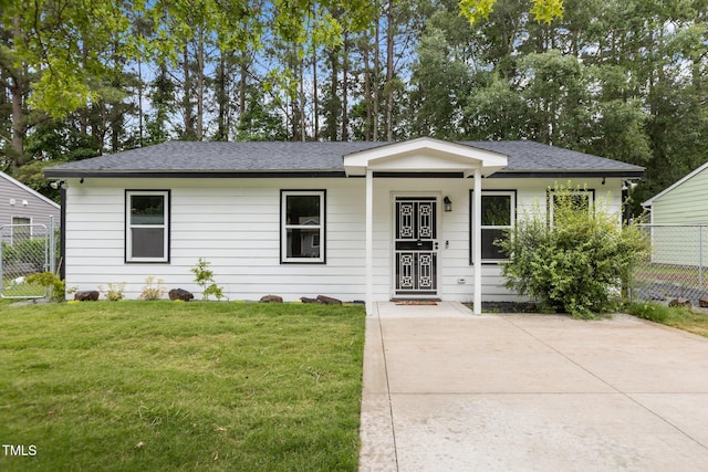 1204 Pecan Pl, Durham, NC 27704 - ranch-style house featuring roof with shingles