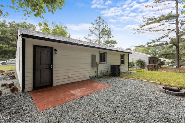 1204 Pecan Pl, Durham, NC 27704 - back of property with central AC unit