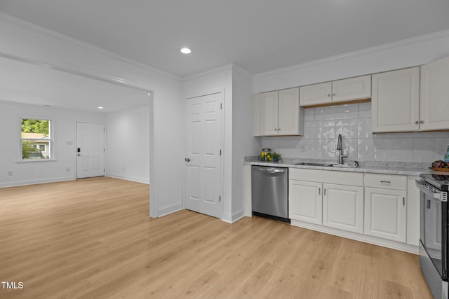 1204 Pecan Pl, Durham, NC 27704 - kitchen with appliances with stainless steel finishes, a sink, ornamental molding, decorative backsplash, and light wood-style floors