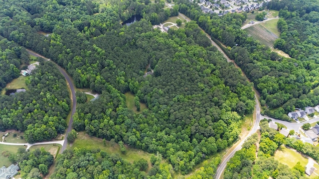 7104 Camp Branch Ln, Apex, NC 27502 - view of property location with a heavily wooded area
