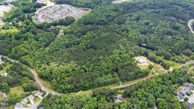 7104 Camp Branch Ln, Apex, NC 27502 - aerial view of property and surrounding area with a heavily wooded area