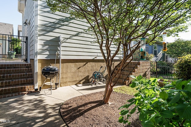 5638 Wade Park Blvd, Raleigh, NC 27607 - view of patio with stairs and area for grilling