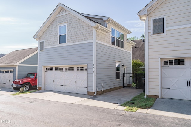 5638 Wade Park Blvd, Raleigh, NC 27607 - view of home's exterior featuring an attached garage and driveway